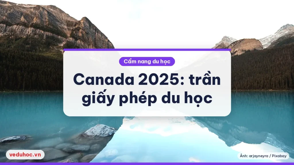Hồ nước phẳng lặng soi bóng dãy núi sáng màu ở Canada, minh hoạ chủ đề giấy phép du học Canada